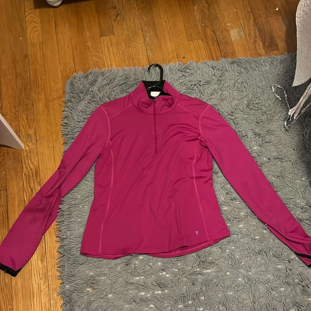 A Danskin Now Athletic running jacket